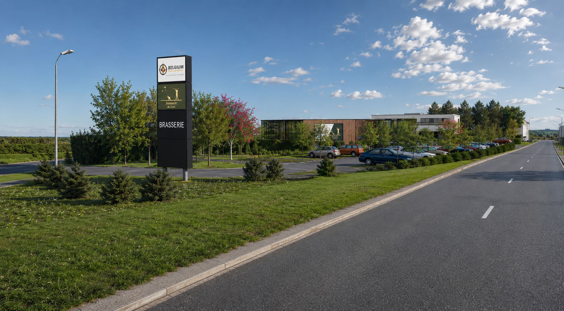 Vue depuis la route avec totem d'enseigne et perspective sur le complexe