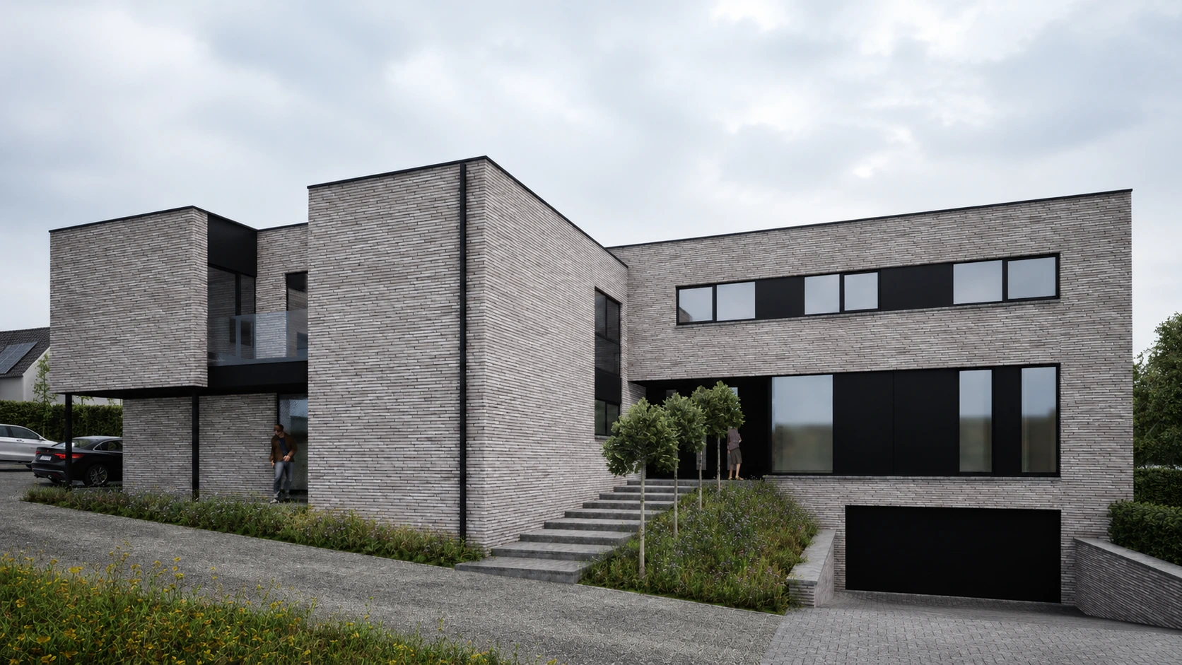Habitation contemporaine en briques claires à volumes cubiques et menuiseries noires