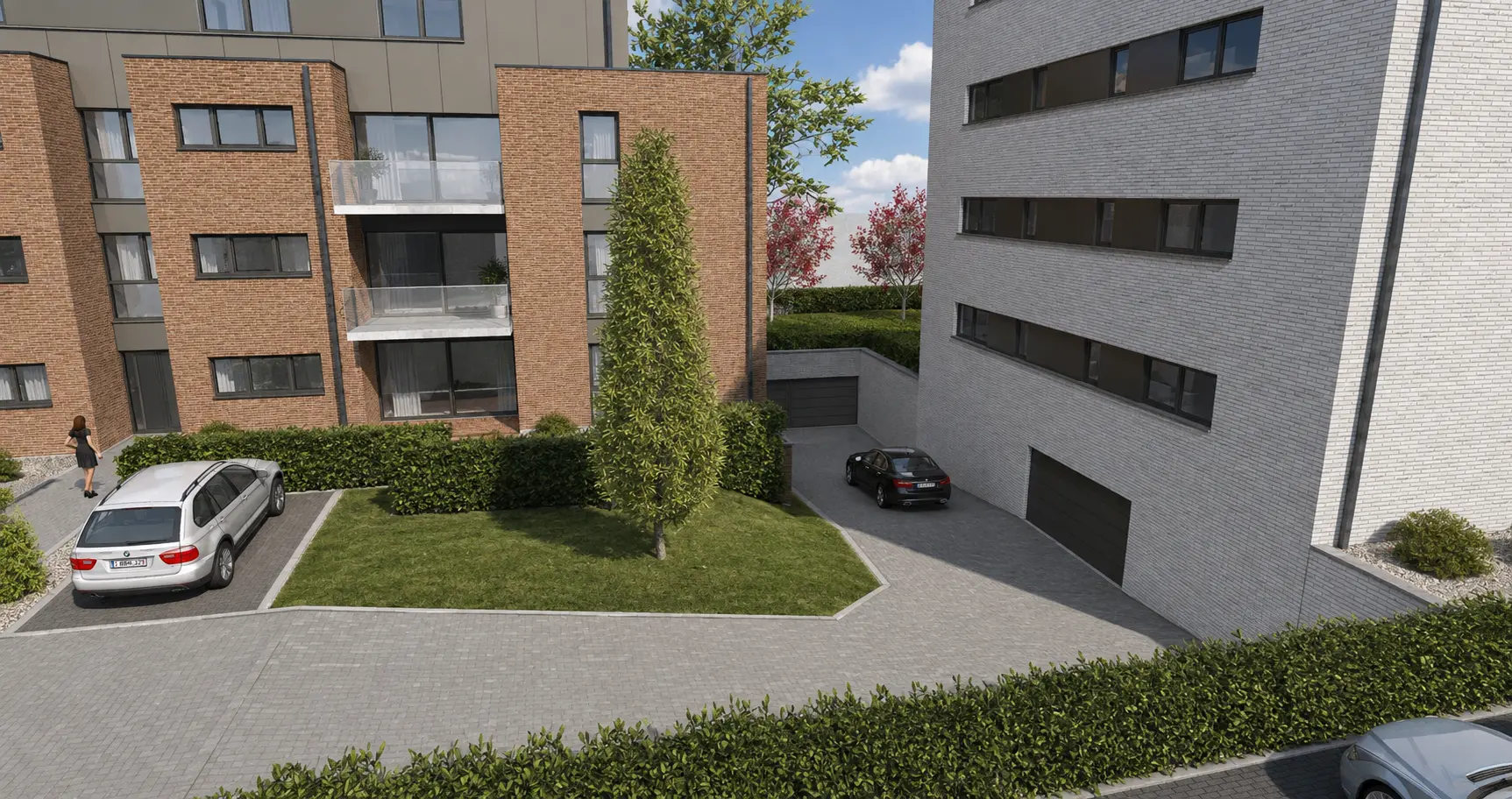 Vue plongeante sur les accès, garages et espaces plantés entre les immeubles