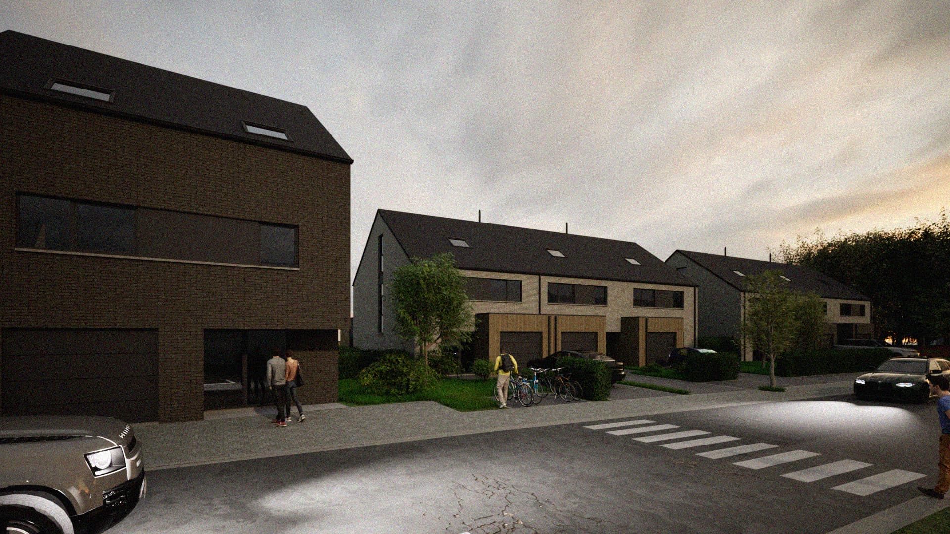 Vue au crépuscule de l'ensemble de logements groupés en briques sombres et claires