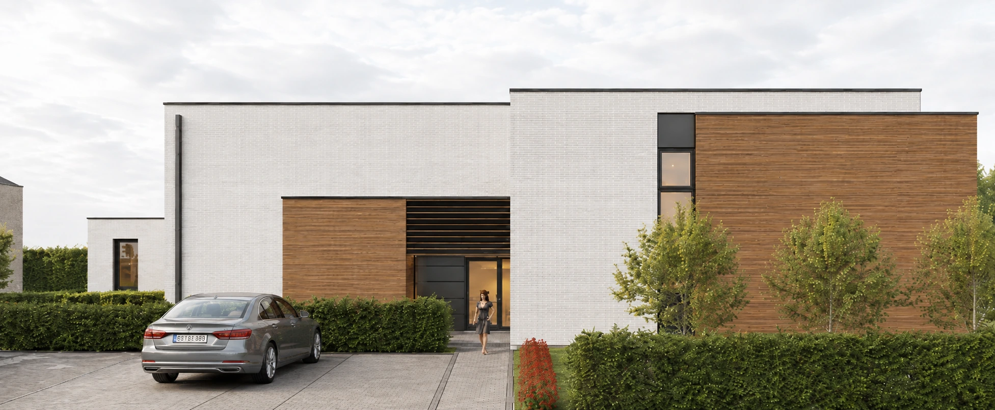 Façade rue d'un immeuble de logements en briques blanches et bardage bois