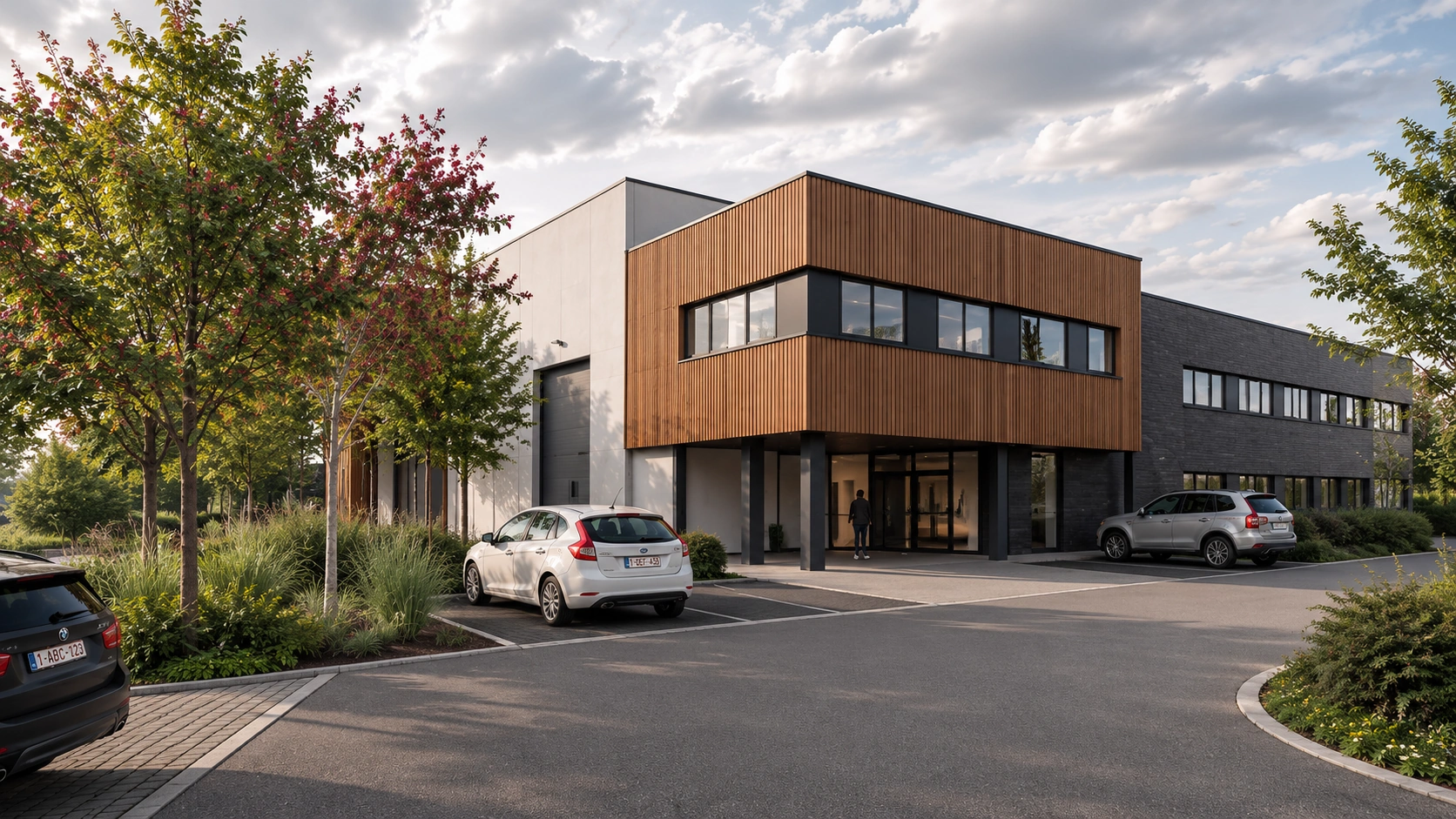 Volume de bureaux en bardage bois en porte-à-faux au-dessus de l'entrée