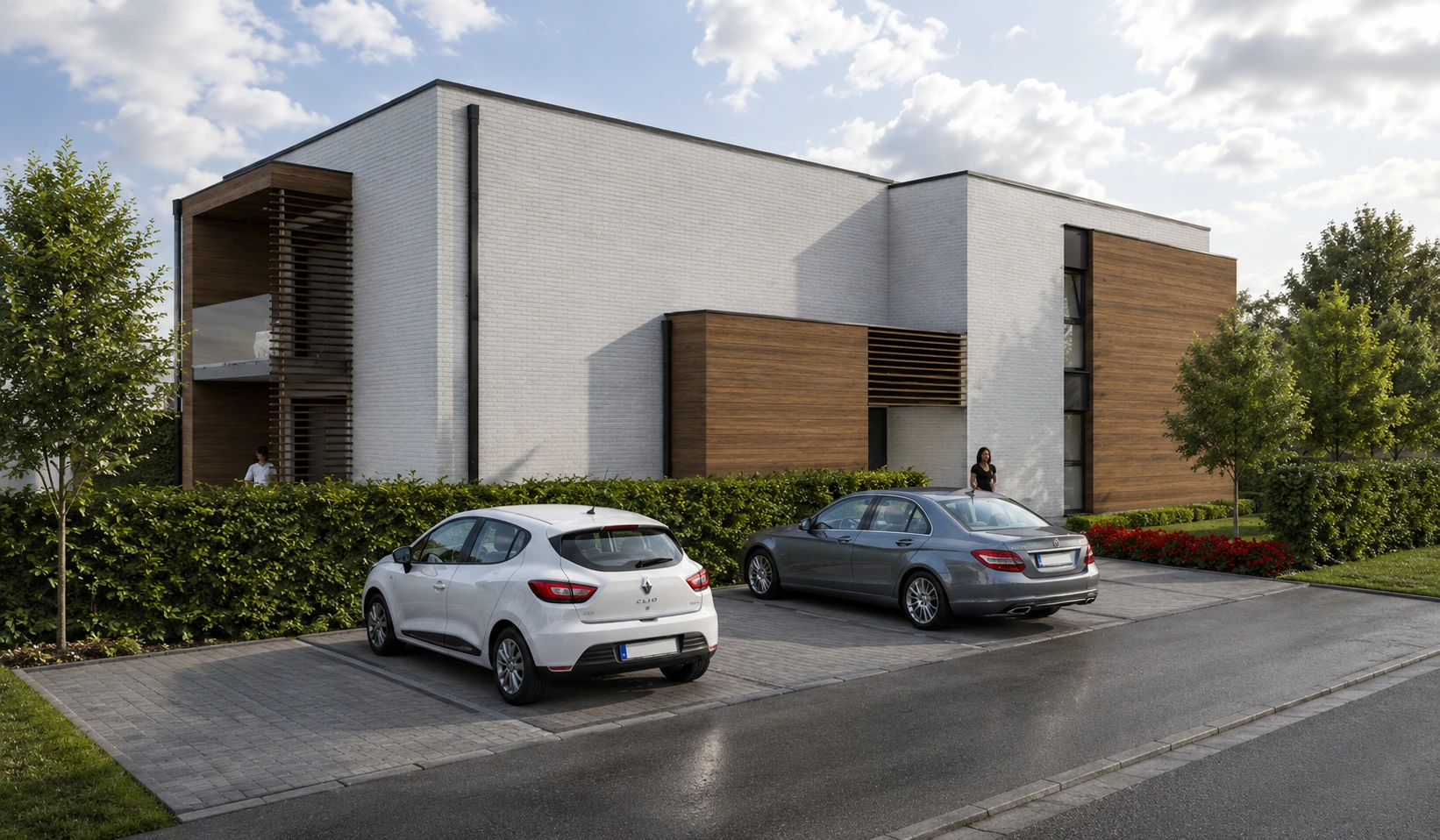 Vue d'angle de l'immeuble depuis le parking avec loggias en bardage bois