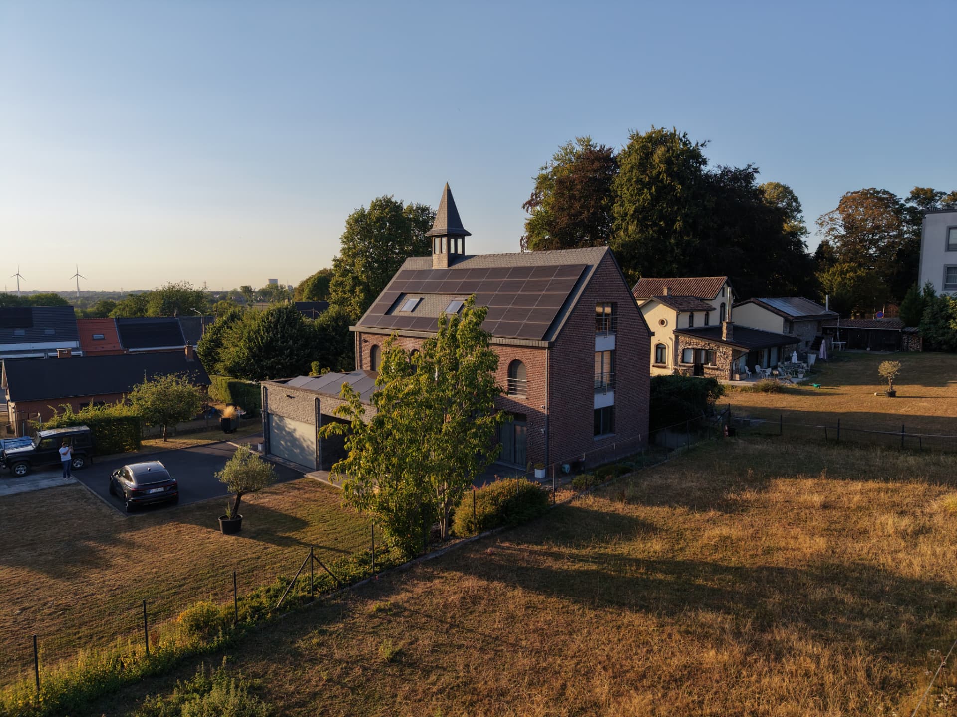 Vue en perspective de l'habitation et de son environnement paysager