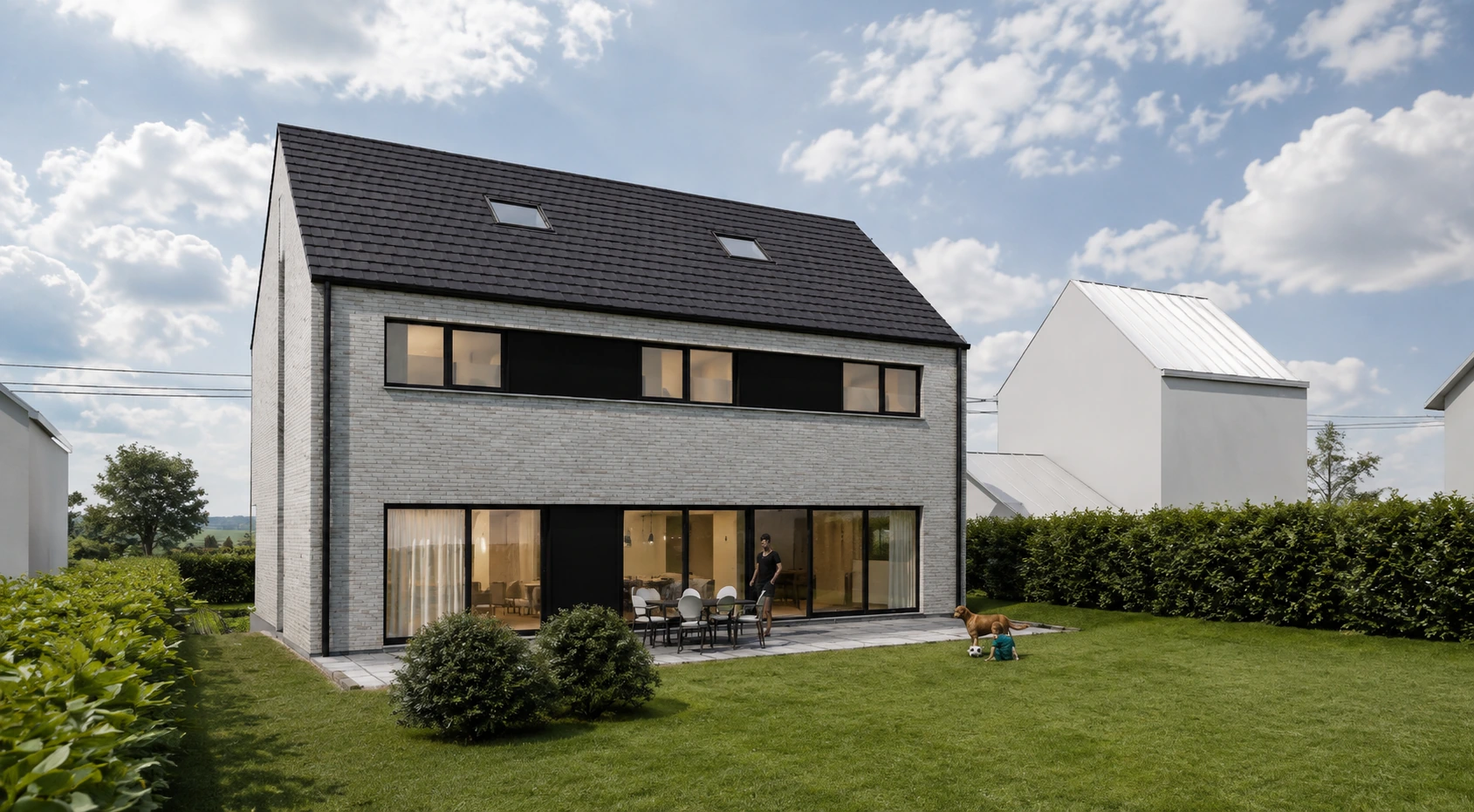 Habitation contemporaine en briques claires à toiture noire à deux pans, vue depuis le jardin